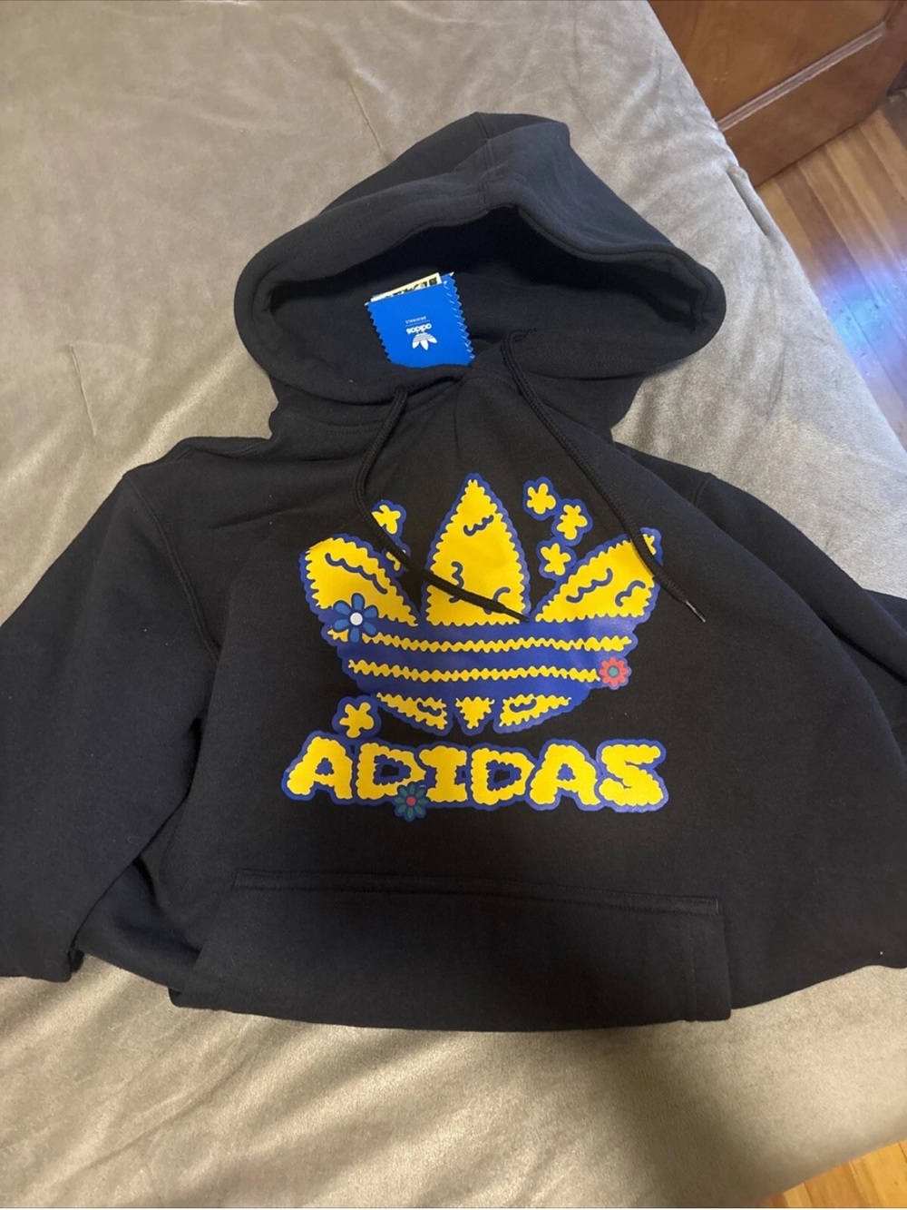 adidas Black Hoodie with Yellow and Blue Floral Trefoil